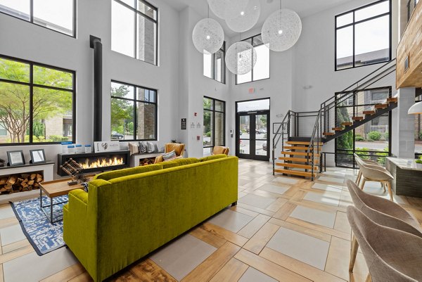 Modern clubhouse with cozy seating areas at The Dakota Apartments, perfect for socializing and events