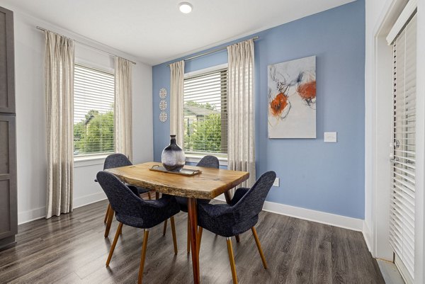 Dining area with elegant decor and modern furnishings at The Dakota Apartments, a luxury community by Greystar