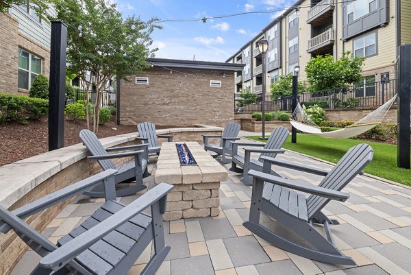 Outdoor patio with fire pit at The Dakota Apartments
