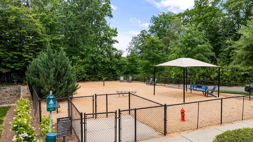 Outdoor sports facility featuring tennis and basketball courts at The Dakota Apartments, a Greystar luxury apartment community