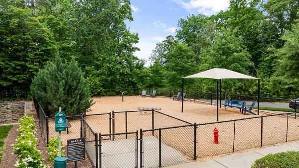 Outdoor sports facility featuring tennis and basketball courts at The Dakota Apartments, a Greystar luxury apartment community