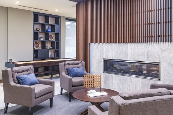 Clubhouse lobby featuring modern decor and spacious seating at Elan Yorktown Apartments