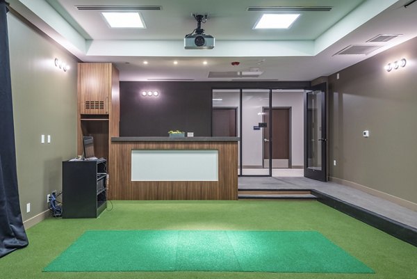 Virtual putting green at Elan Yorktown Apartments, perfect for golf enthusiasts seeking luxury living and recreational amenities