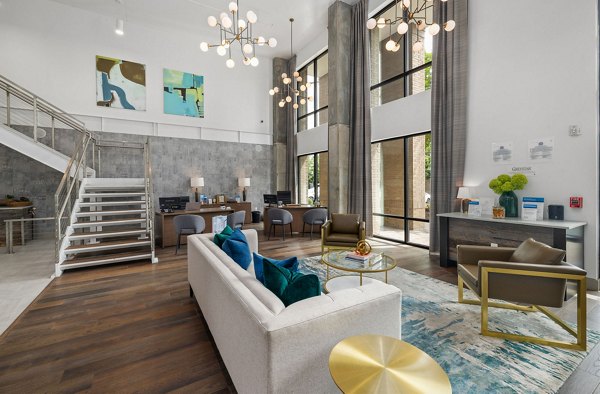 Clubhouse featuring modern design and seating areas at Republic Flats Apartments