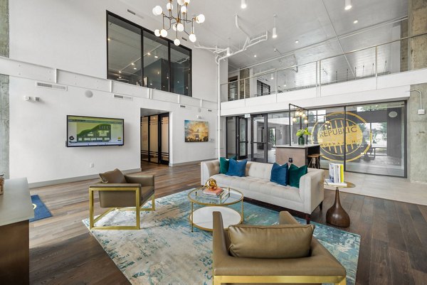 Modern clubhouse at Republic Flats Apartments featuring luxurious seating and contemporary decor
