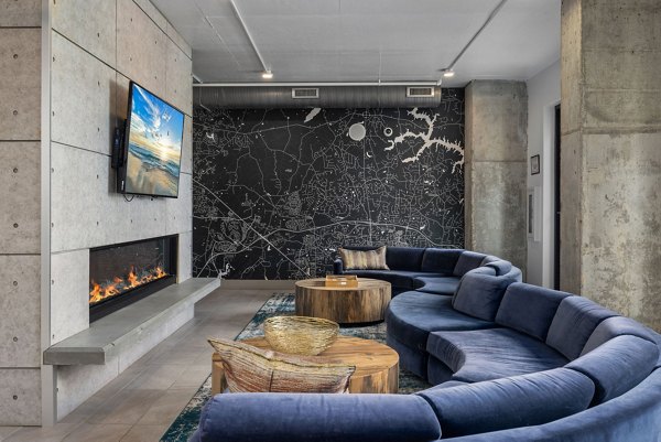 Cozy outdoor fire pit area at Republic Flats Apartments, perfect for social gatherings