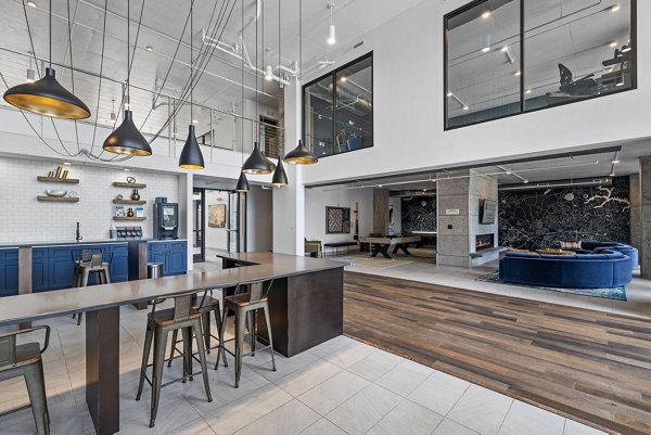 Modern clubhouse with chic design at Republic Flats Apartments, ideal for social gatherings and events in a luxury community setting