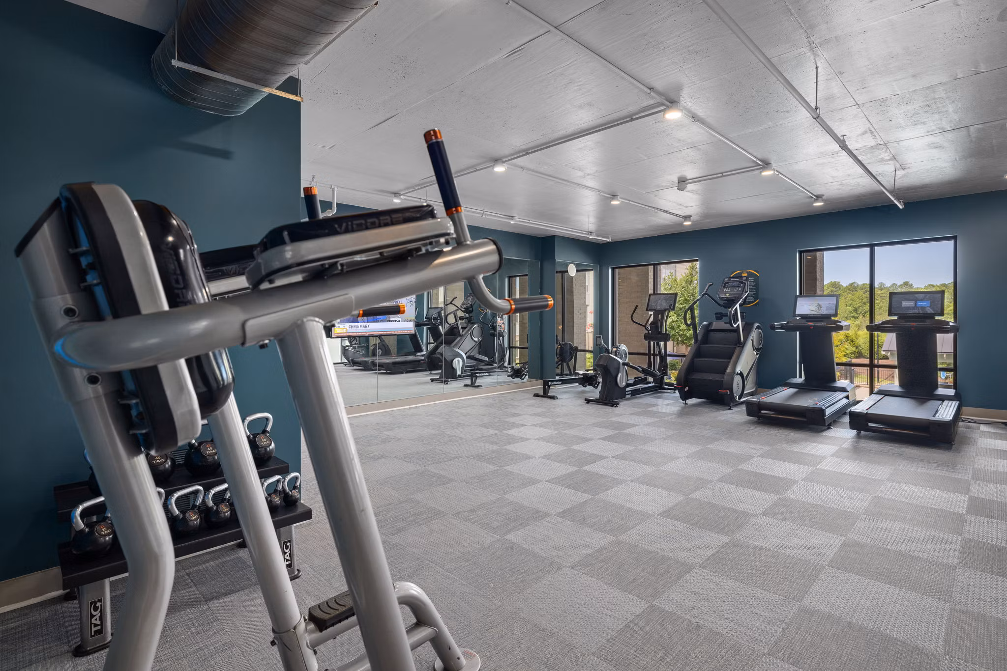 Modern fitness center with state-of-the-art equipment at Republic Flats Apartments, perfect for maintaining an active lifestyle