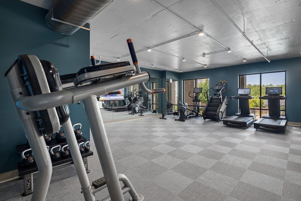 Modern fitness center with state-of-the-art equipment at Republic Flats Apartments, perfect for maintaining an active lifestyle