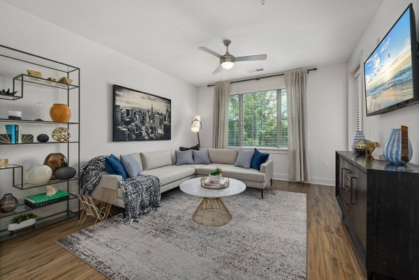 Modern living room with sleek furniture at Republic Flats Apartments, luxury lifestyle near downtown