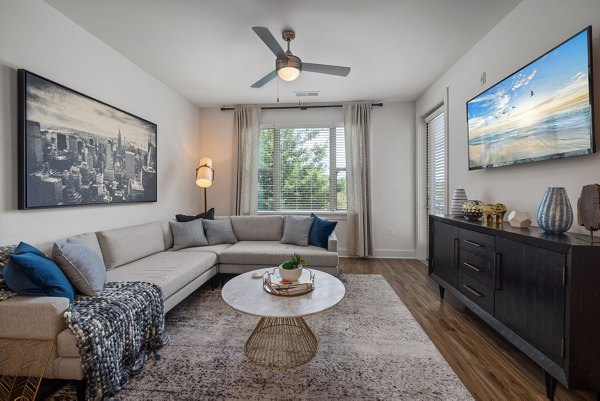 Stylish living room with contemporary furnishings at Republic Flats Apartments