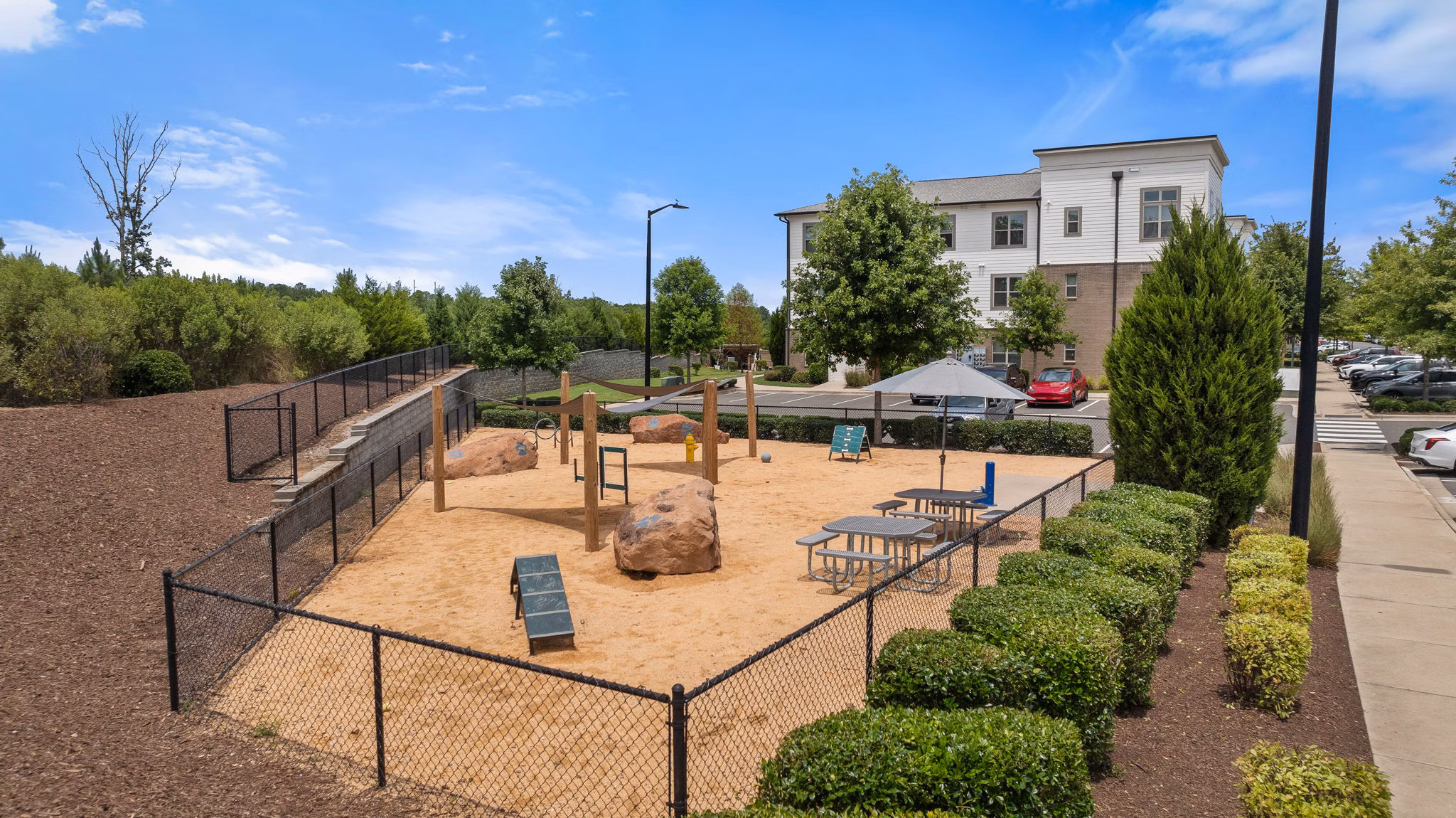 Children's playground at Republic Flats Apartments offering a fun, safe courtyard setting for families