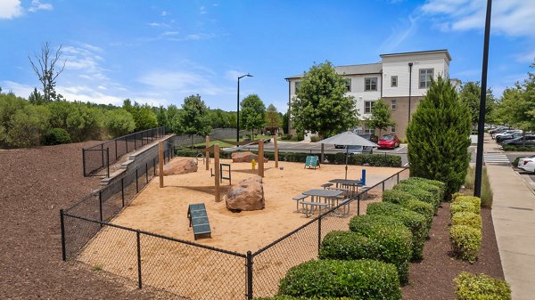 Children's playground at Republic Flats Apartments offering a fun, safe courtyard setting for families