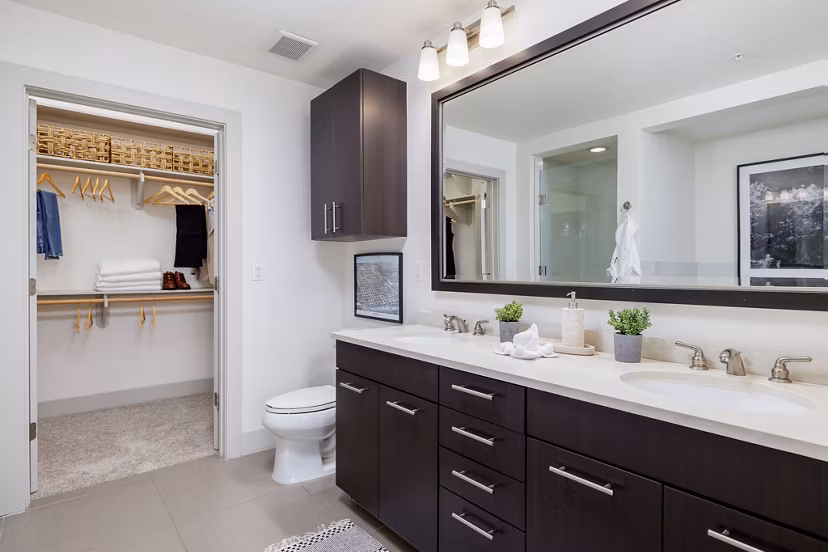 Modern bathroom with sleek fixtures and ample lighting at Northshore Apartments