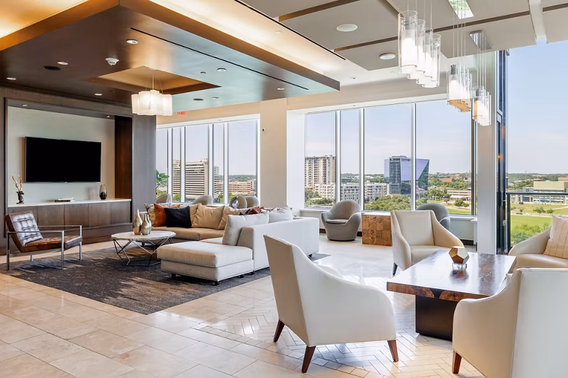Modern clubhouse with elegant seating and ambient lighting in Northshore Apartments for luxury community events