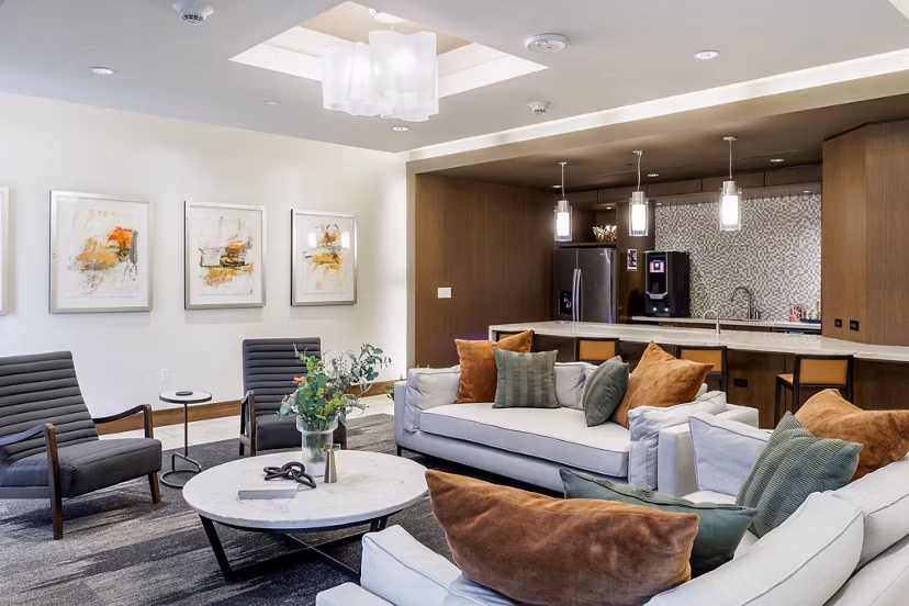 Clubhouse at Northshore Apartments: Modern design featuring spacious seating and greenery in upscale luxury apartments