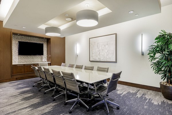 Clubhouse meeting facility at Northshore Apartments: Modern event space with ample seating and multimedia capabilities for luxury gatherings
