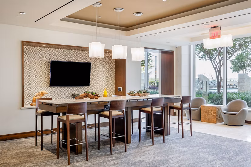 Clubhouse at Northshore Apartments featuring modern design and spacious seating areas
