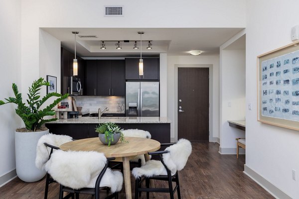 Elegant dining room with modern decor at Northshore Apartments, a luxury property managed by Greystar