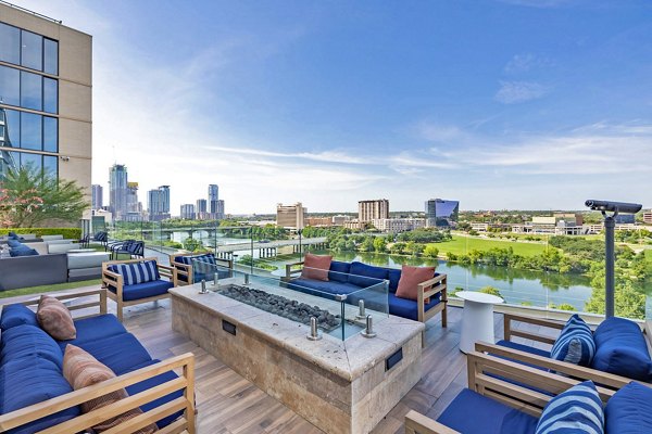 Outdoor patio with fire pit at Northshore Apartments, a Greystar luxury apartment community