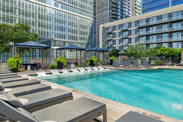 Resort-style pool at Northshore Apartments featuring luxurious seating areas