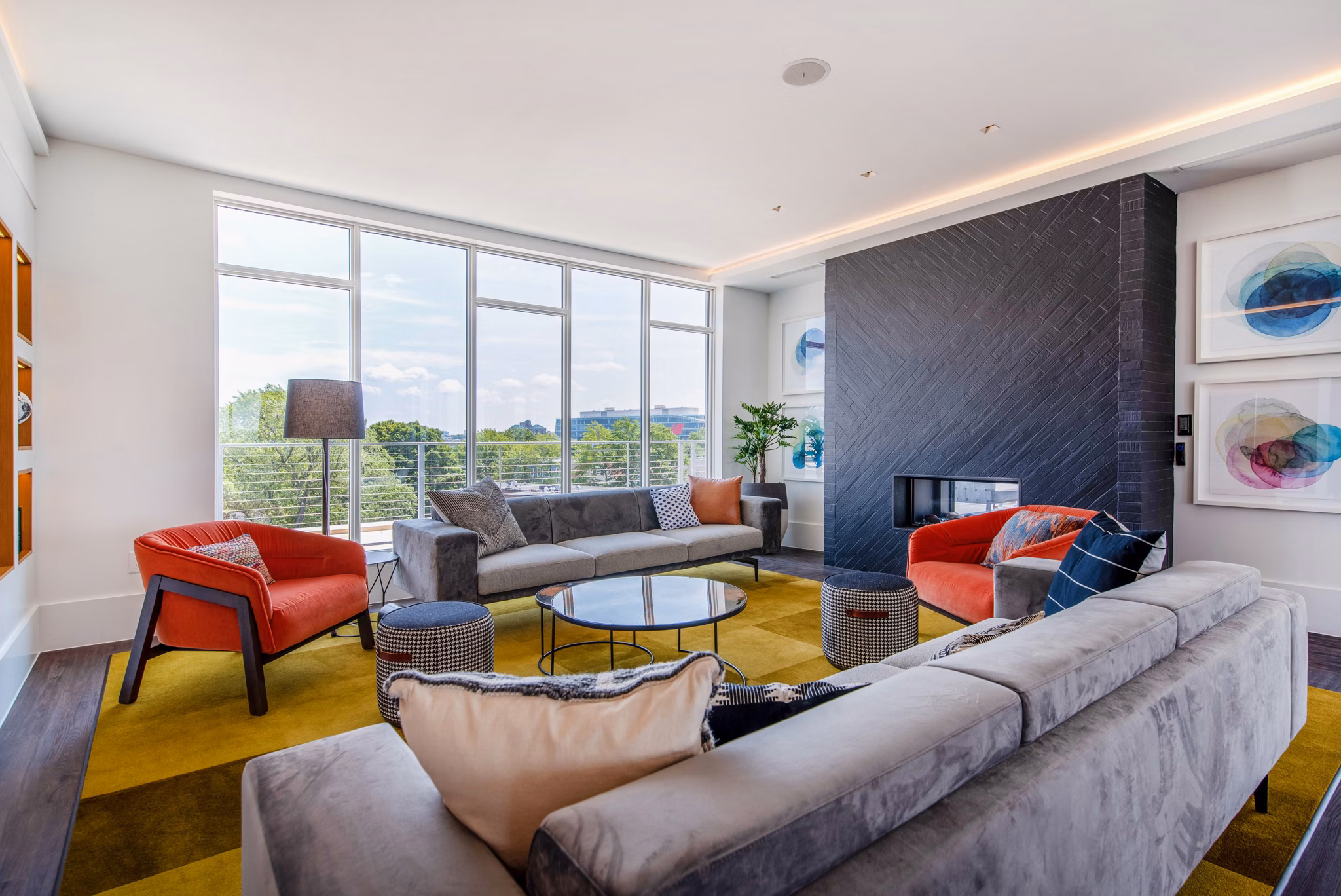 Elegant clubhouse with modern decor at Radius Apartments for socializing and events