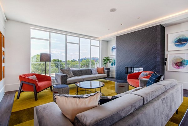 Elegant clubhouse with modern decor at Radius Apartments for socializing and events