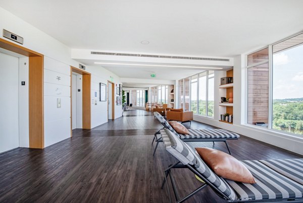 Clubhouse featuring modern seating and recreational areas at Radius Apartments