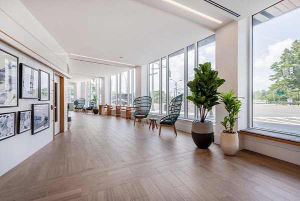 Spacious clubhouse featuring modern amenities at Radius Apartments, perfect for social gatherings and relaxation