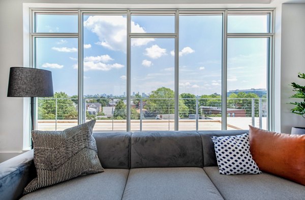 Modern clubhouse with lounge seating at Radius Apartments