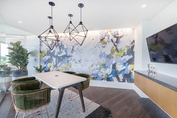 Clubhouse with modern design and comfortable seating at Radius Apartments