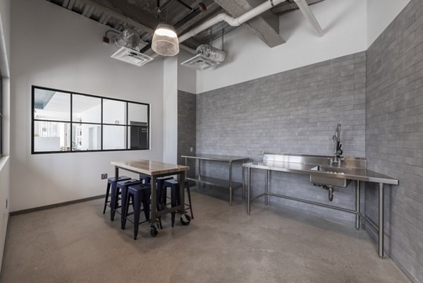 Modern clubhouse with expansive seating and billiard tables at Radius Apartments, a luxury community offering premium amenities and social spaces