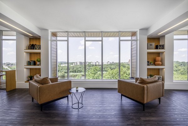 Clubhouse featuring modern design and comfortable seating at Radius Apartments, a luxury community by Greystar