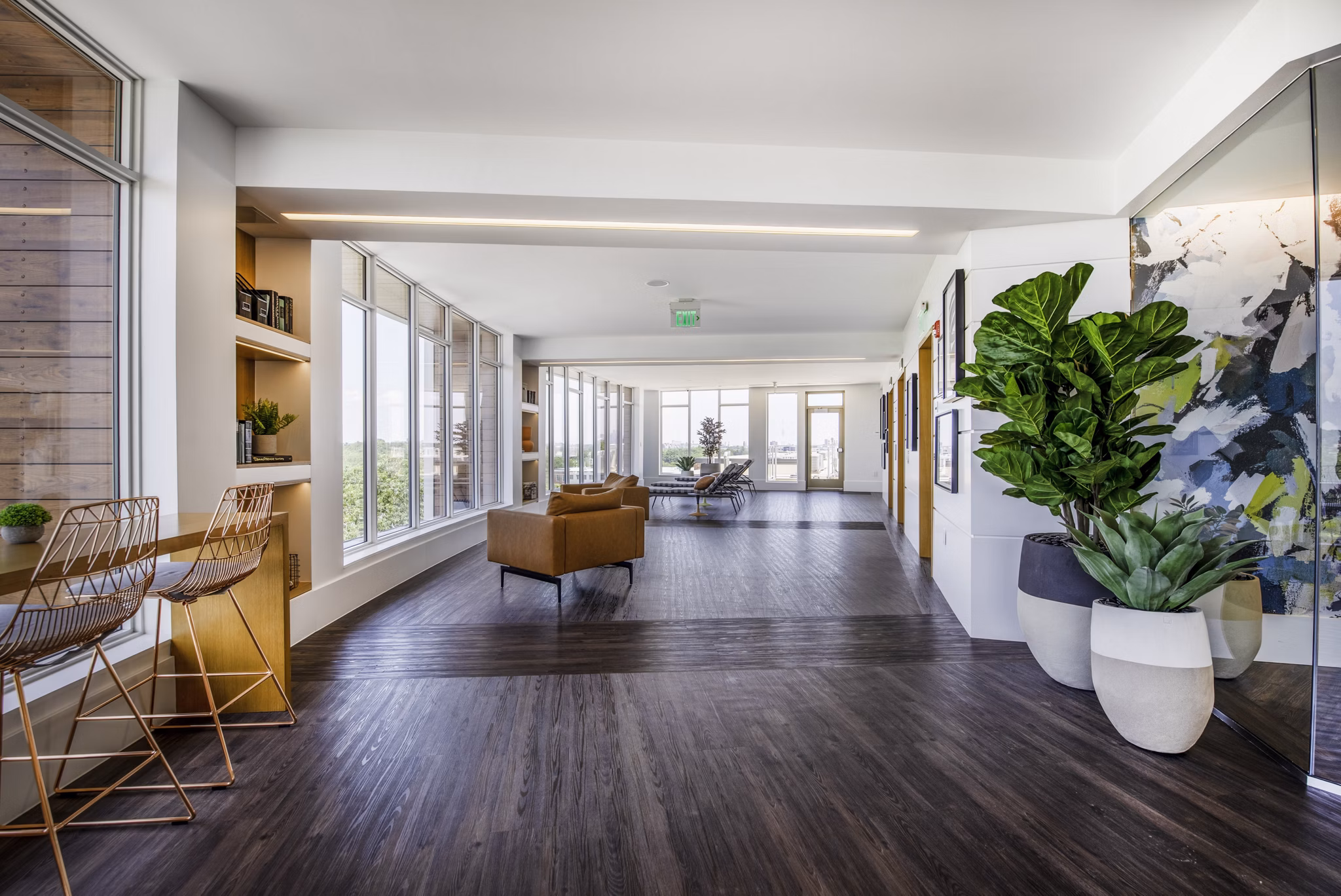 Modern clubhouse with stylish seating and vibrant decor at Radius Apartments
