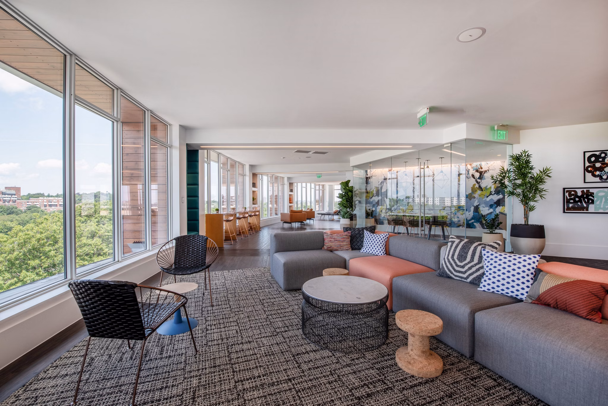 Modern clubhouse with cozy seating and billiards in Radius Apartments