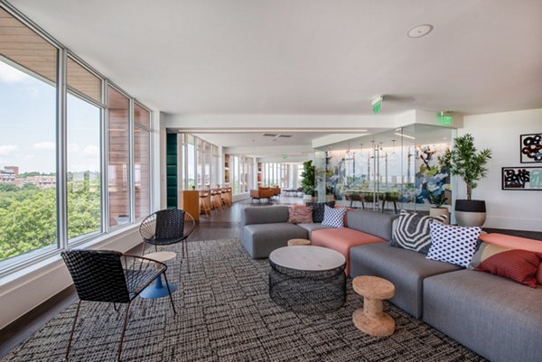 Modern clubhouse with cozy seating and billiards in Radius Apartments