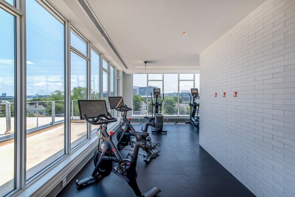 Modern fitness center with state-of-the-art equipment at Radius Apartments