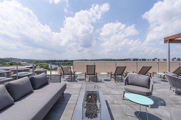 Cozy fire pit area at Radius Apartments, perfect for outdoor gatherings and relaxation