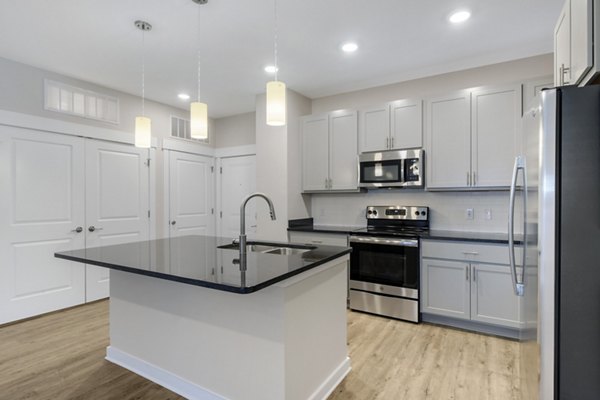 Modern kitchen with stainless steel appliances at Proximity Northlake Apartments