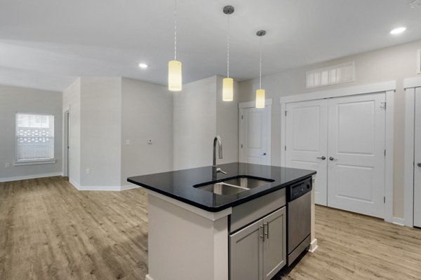 Modern kitchen with stainless steel appliances at Proximity Northlake Apartments in Charlotte