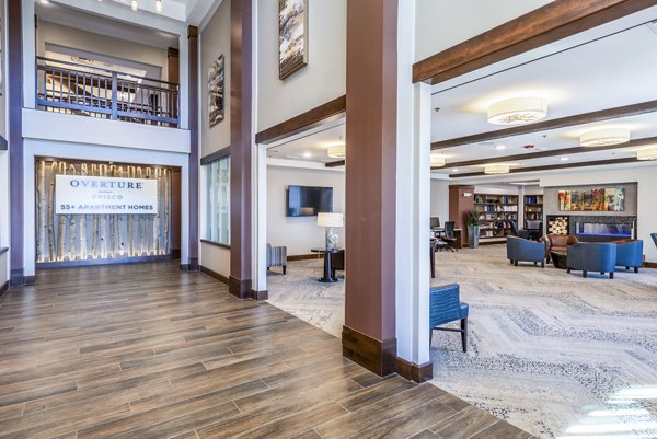 Modern clubhouse lobby with elegant seating at Overture Frisco Apartments, a luxury community offering vibrant social spaces for residents