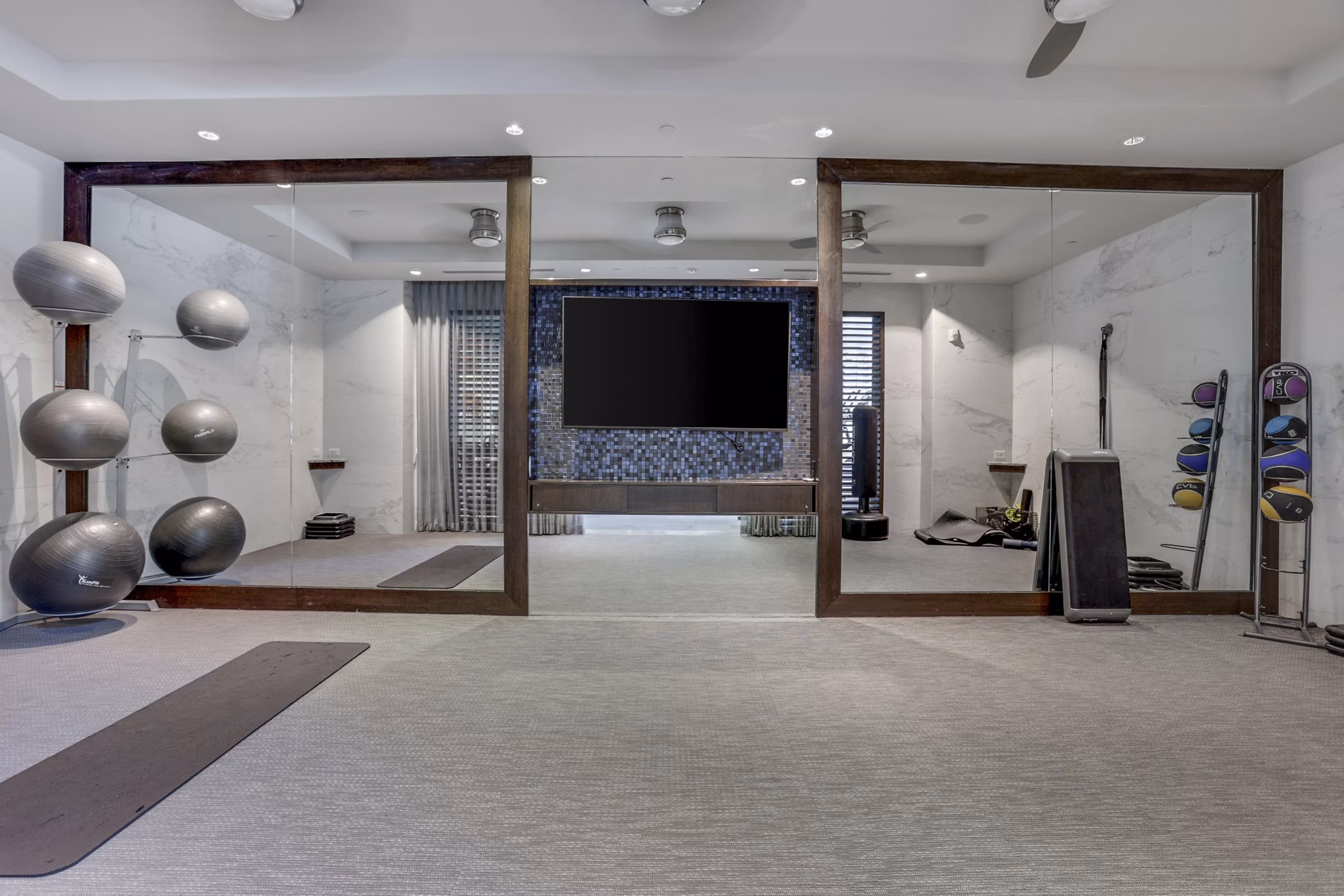 fitness center at The Bryant at Buckhead Village Apartments