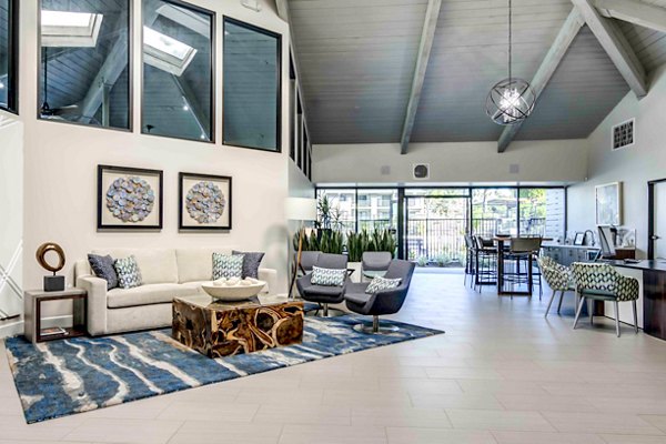 Clubhouse lobby with contemporary design at Solana at Grand Apartments, featuring luxurious seating and elegant decor
