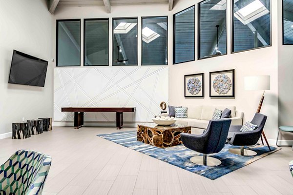 Clubhouse with modern design and cozy seating at Solana at Grand Apartments
