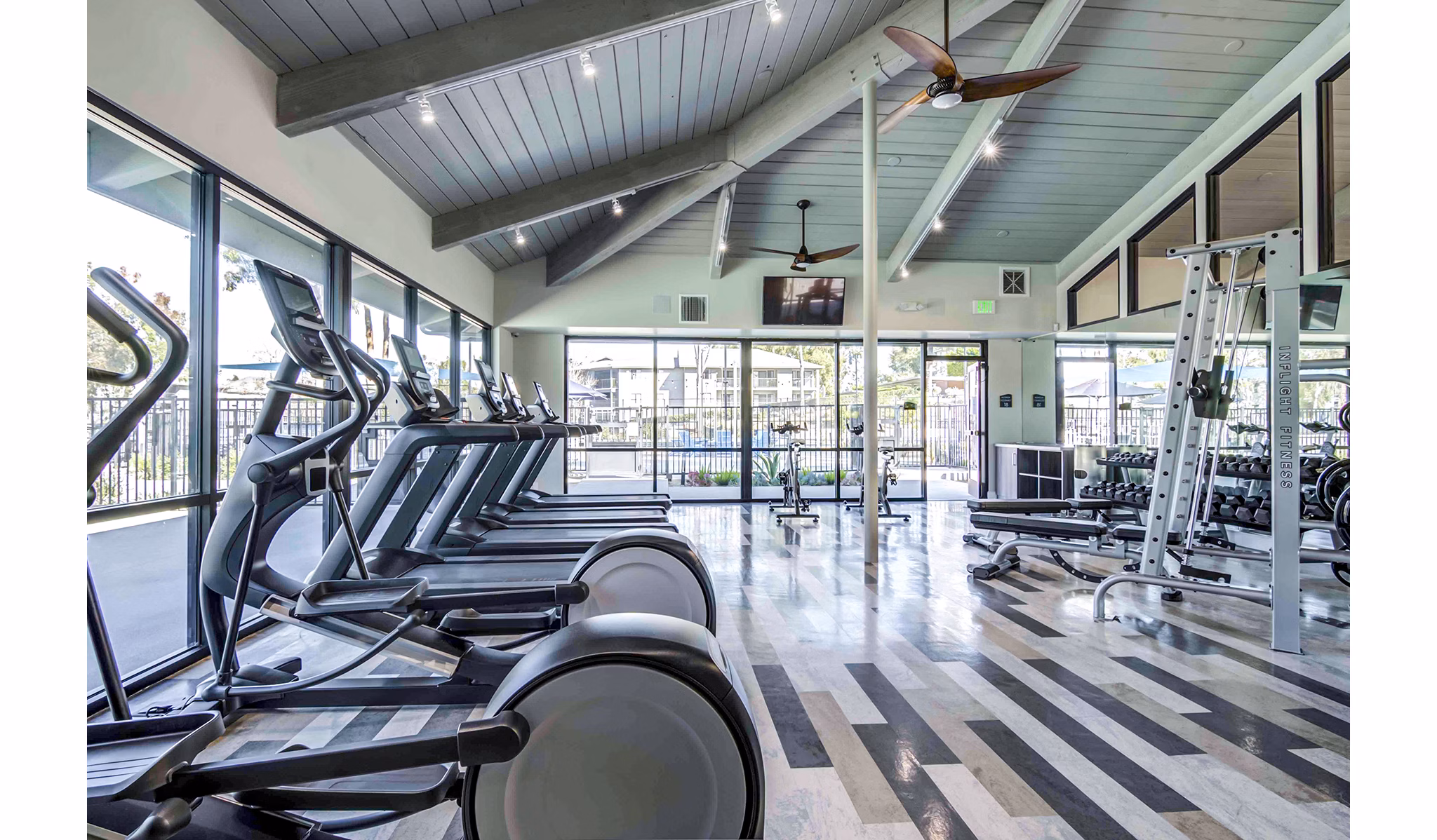 Modern fitness center with state-of-the-art equipment at Solana at Grand Apartments