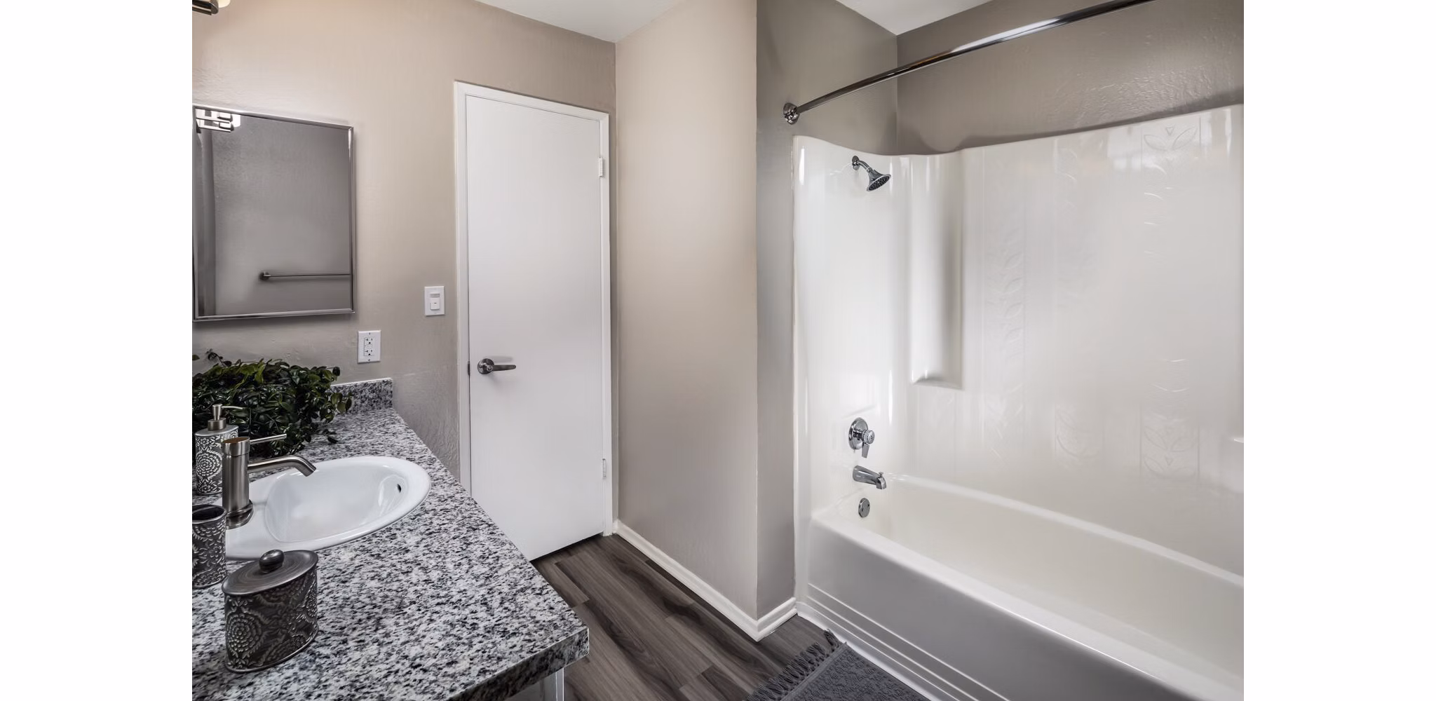 Bathroom featuring sleek fixtures and modern design at Corte Bella Apartments, offering luxury living with contemporary amenities