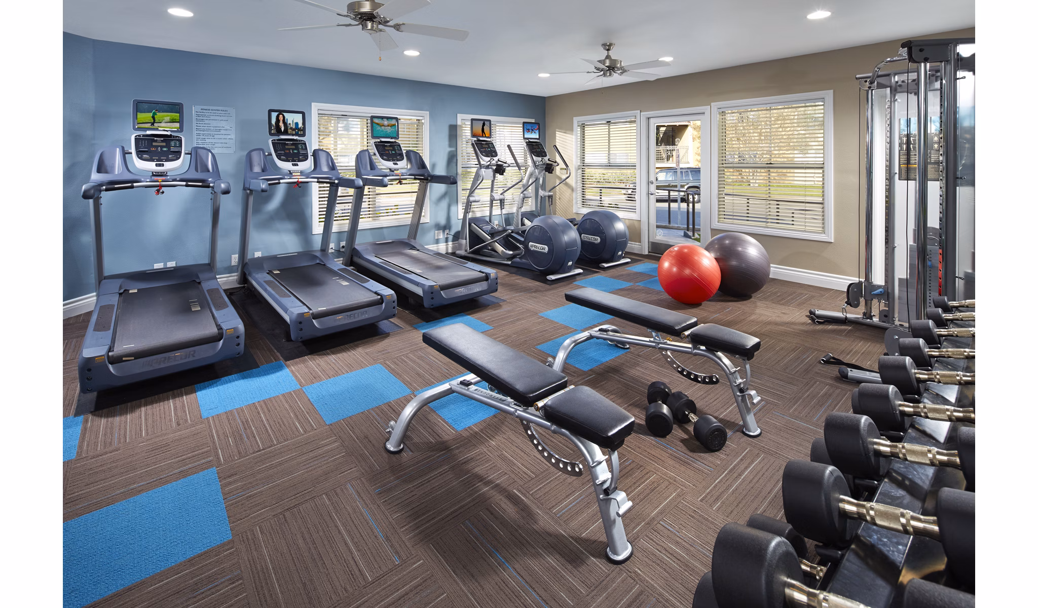 State-of-the-art fitness center with modern equipment at Corte Bella Apartments