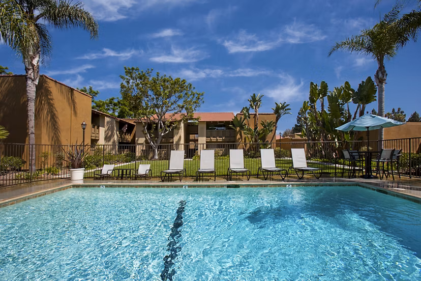 Modern outdoor pool at Corte Bella Apartments offering luxury living