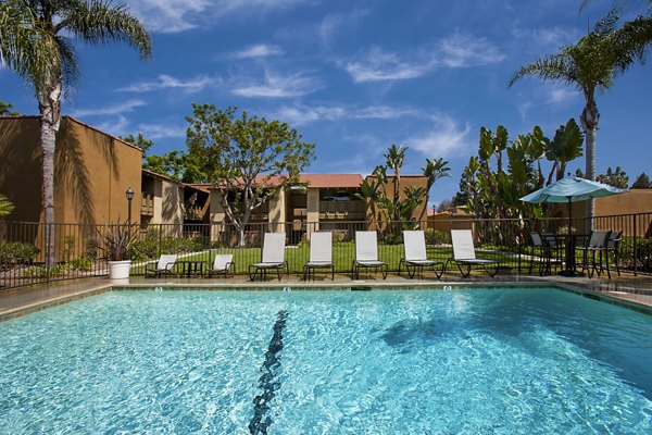 Modern outdoor pool at Corte Bella Apartments offering luxury living