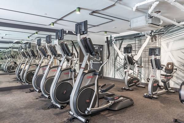 fitness center at MacArthur Commons Apartments